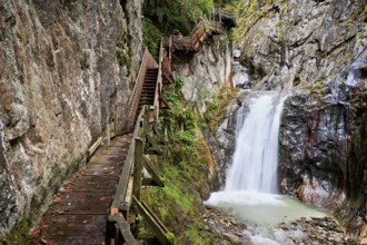 Wooden walkway next to waterfall in the Durnand Gorge, Les Valettes, Canton of Valais, Switzerland