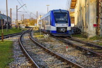 Modern Bavarian Regional Railway train, BRB, parked in front of Augsburg railway park,