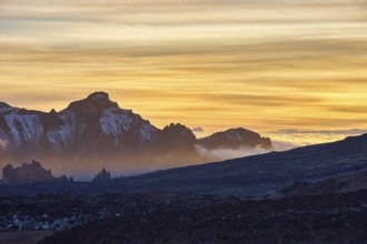 Sunset over mountains with dramatic clouds and silhouettes, UNESCO World Heritage Site, Teide