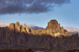 Dramatically illuminated rocks under a partly cloudy sky, UNESCO World Heritage Site, Teide