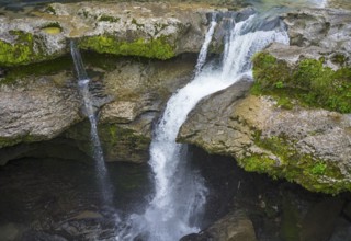 Water falling into a river over moss-covered rocks, Martvili Gorge, Martvili Canyon, Inchchuri