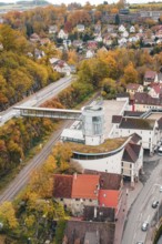 View of urban area with tower and railway tracks in autumn surroundings, Hermann Hessebahn, ZOB