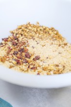 Nuts and berries are well mixed in a white bowl, Weihnachtsbacken, Haselstaller Hof, Wildberg,