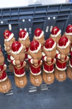 Several chocolate figures in Santa Claus shape in a storage box, Christmas baking, Haselstaller