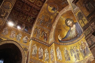 Gold-decorated mosaic depicting Christ in the interior of a Byzantine church, Monreale, cathedral,