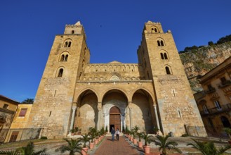 Impressive cathedral with main façade and symmetrical towers in clear skies, historic atmosphere,