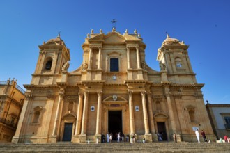 Noto, large baroque church with magnificent façade, stairs leading to the entrance, Baroque towns