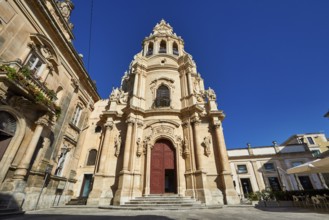 Ragusa, Baroque church with imposing façade against clear blue sky in Sicily, Baroque towns of