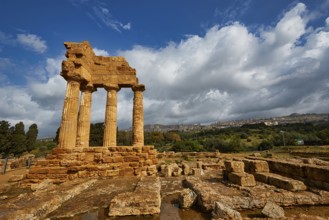 Temple of Dioscuren, temple ruins in sandstone landscape under dramatic sky, Valley of the Temples,