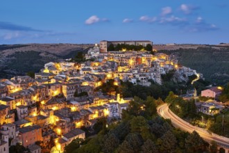 Ragusa, illuminated hill town view at dusk with atmospheric atmosphere, Baroque towns of Sicily,