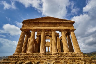Temple of Concordia, imposing ancient temple with columns under a blue sky, Valley of the Temples,