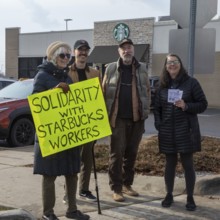 Detroit, Michigan USA - 15 November 2025 - People picket a Starbucks store in solidarity with a