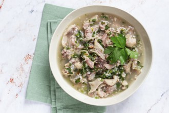 Muzhuzhi, a Georgian dish made from pork legs, with spices and herbs, homemade