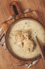 Chikhirtma chicken soup, Georgian dish, with lavash, top view, no people