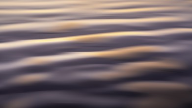 Ocean waves in evening light, long exposure with ICM (Intentional Camera Movement)