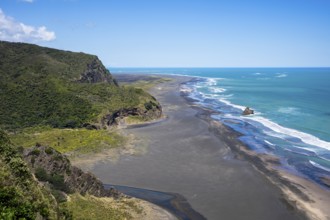 Landscape in New Zealand with sea and sandy beach. View of Karekare Beach and Whakaruro Bay beaches