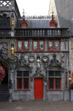 Richly decorated façade of the criminal office at the St. Ivo Chapel of the Holy Blood Basilica,