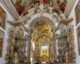 Interior of the historical Baroque church and colorful altar of Bom Jesus de Matosinhos in