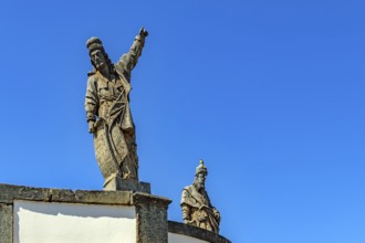 Image of two of the 12 biblical prophets sculpted by Aleijadinho in the sanctuary of Bom Jesus de