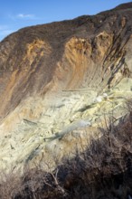 Steaming fumaroles in the Owakudani geothermal area at Komagatake volcano, Hakone, Japan
