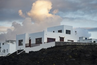 Typical white houses in the town of La Santa, at sunset, Lanzarote, Canary Islands, Spain
