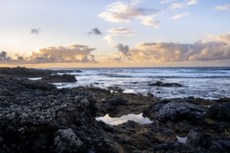 Seaside coast with volcanic rocks at sunset, La Santa, Lanzarote, Canary Islands, Spain
