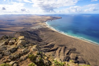 Castillejo viewpoint, view from the Risco de Famara cliffs to the coast and the sea with Famara