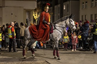 Martinszug in Essen-Rüttenscheid, the parish of St. Lambertus, Saint Martin actor on a horse, with