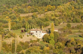 Autumn valley landscape farmhouse building near village of Echo or Hecho, Valle de Hecho, Huesca