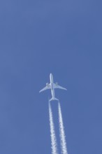 Boeing 787-9 Dreamliner jet passenger aircraft of Gulf Air airlines flying in a blue sky with