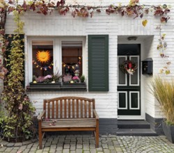 Decorated house façade for the traditional Martin procession in Tiefstraße, Altstadt, Kempen, Lower
