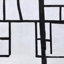 Unusual framework of irregularly arranged rectangular wooden beams in three compartments,