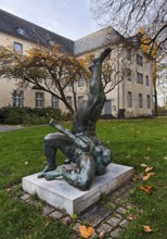 Sculpture entitled Wrestling Group by Jo Jastram in front of the former Kempen Franciscan monastery