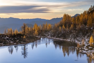 Laghetto dei Saléi mountain lake with autumnal larches (Larix), Onsernone Valley, Canton of Tessin,