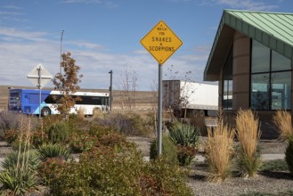Aragonite, Utah - A sign urges travelers to beware of snakes and scorpions at a rest area along