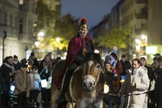 Rider on horseback during the lantern parade for Marting Day in Berlin Moabit on 11.11.2025