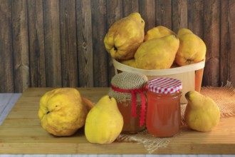 Picturesque still life with quinces and homemade quince jelly, autumn, Germany
