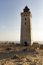 Rubjerg Knude lighthouse, walkers, evening mood in summer, Løkken, Lokken, North Jutland, Denmark