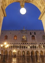 West façade of the Doge's Palace on the Piazzetta in the evening in rain, Venice, Veneto, Italy