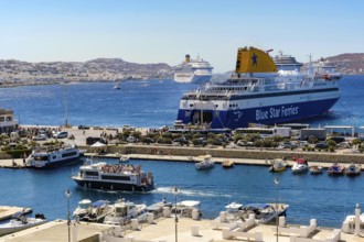Mykonos, Cyclades, Greece - Mykonos New Port, a Blue Star Ferries ferry, is located on the quay in