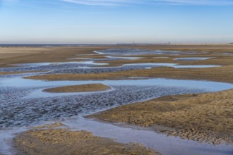 East beach of the East Frisian island of Spiekeroog, at low tide, tidal creek, watercourse at low