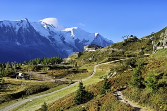 Mountain station of the La Flégère cable car, with the snow-covered Mont Blanc massif at the back,