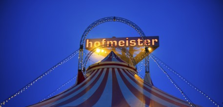 Circus, circus tent, logo behind furniture store Hofmeister, blue hour, Sindelfingen,