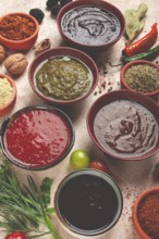 Assortment of Georgian sauces and spices, top view, set of spices and tkemali, Georgian, food