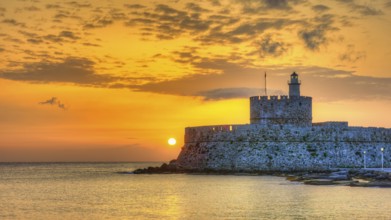 Agios Nikolaos fortress, glowing sunrise behind a castle by the sea, conveys peace, UNESCO World