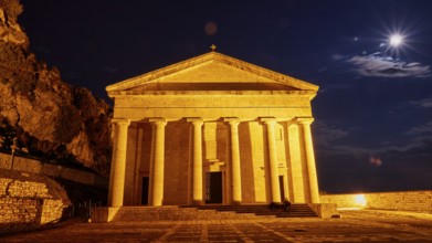 Historic temple at night with lighting and full moon in the sky, UNESCO World Heritage Site, Old