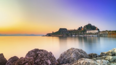 Old fortress, romantic view of a fortress at sunrise over calm water, UNESCO World Heritage Site,