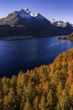 Mountain landscape, mountain lake, larch forest, autumn, autumn color, morning light, sunny, aerial