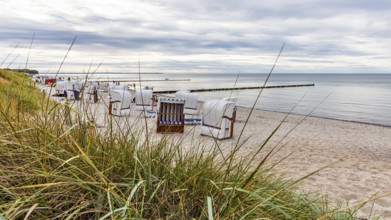 Beach with beach chairs on Schwarzen bush on the island of Poel on the Baltic Sea,