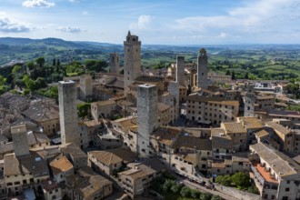 City view of San Gimignano, gender towers and medieval buildings, Tuscany, Italy